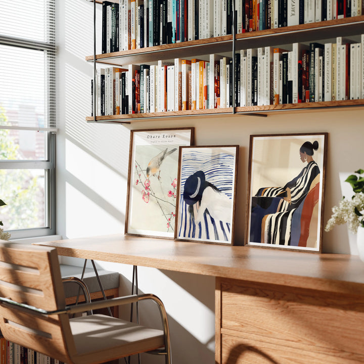 three vertical wood frame mockups on a desk for printable art previews