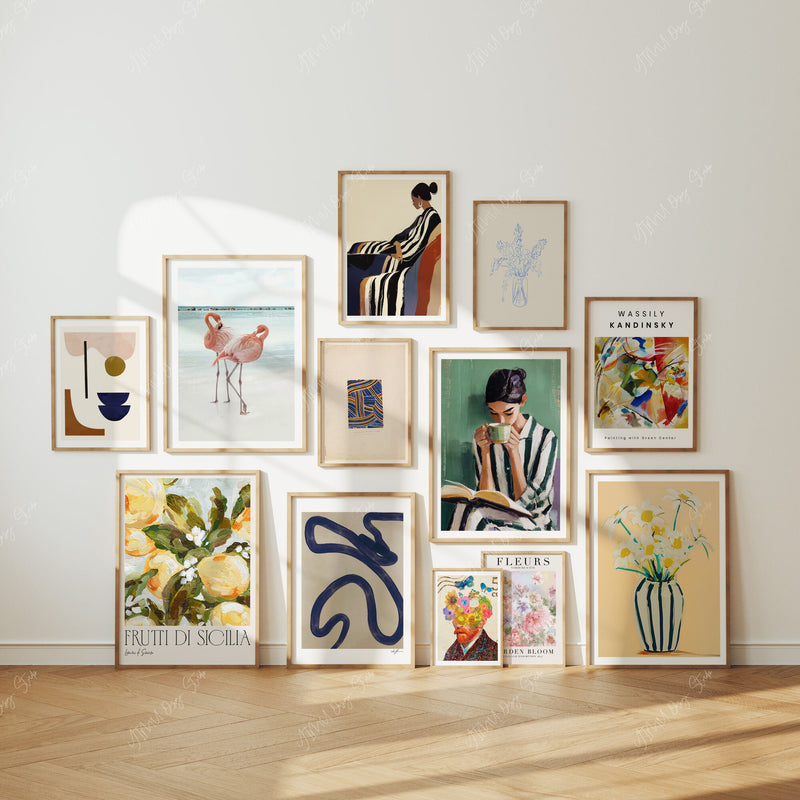 Collection of framed artworks on a wall