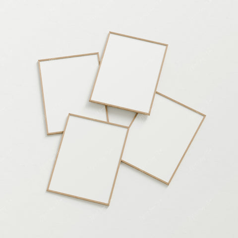 Wood frame wall art mockup with four vertical prints for shop images